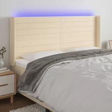   vidaXL krémszínű szövet LED-es fejtámla szárnyakkal 163x16x118/128 cm