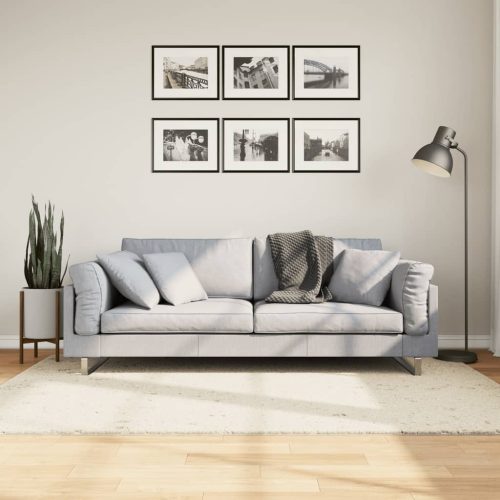 vidaXL krémszínű hosszú szálú bozontos modern szőnyeg 140 x 200 cm